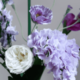 Bouquet de fleurs artificielles violette
